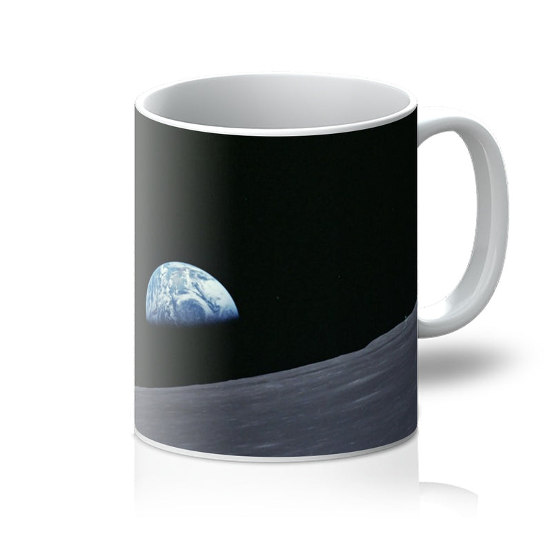 Earthrise 11oz white mug printed with Earth rising over the Moon, handle on the right