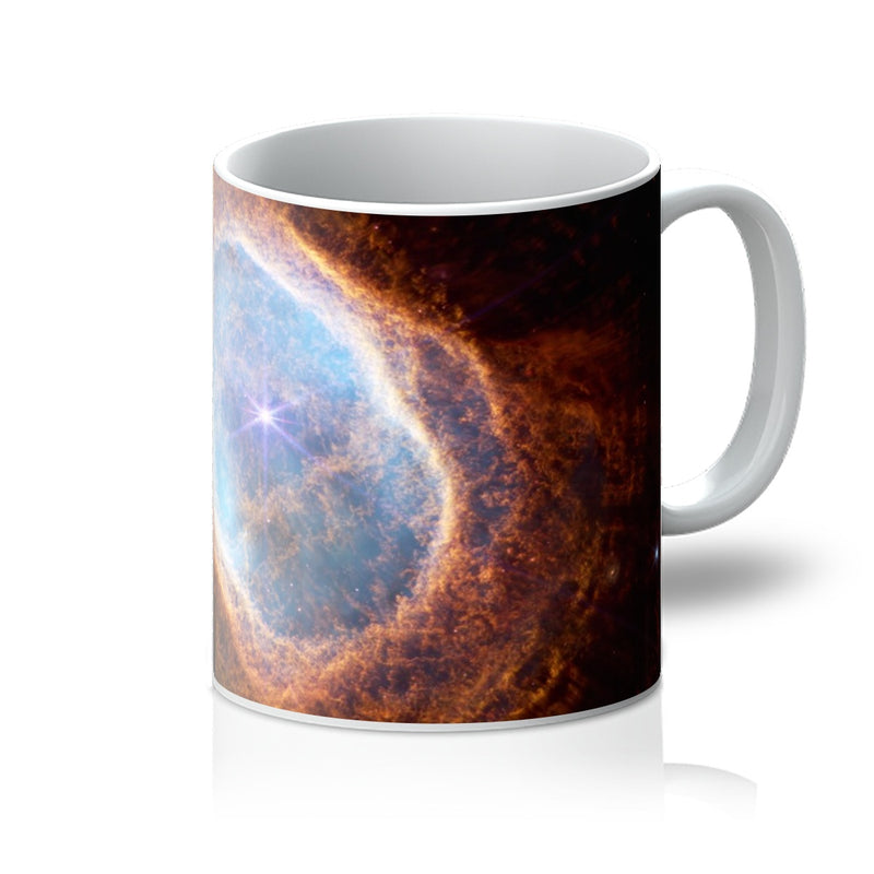 Southern Ring Nebula 11oz white mug printed with glowing rings of gas around a dying star, handle on the right