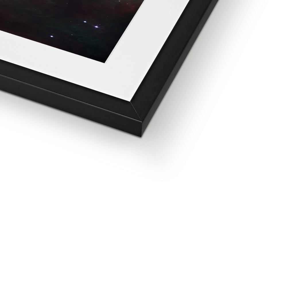 Close-up of the bottom corner of an Orion Nebula framed print showing the black frame and white mount