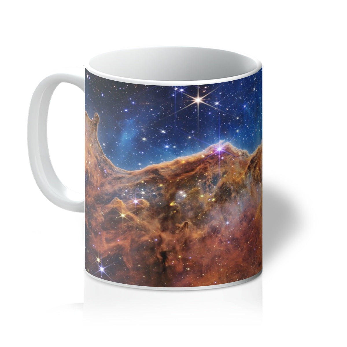 Cosmic Cliffs 11oz white mug printed with the Carina Nebula, handle on the left