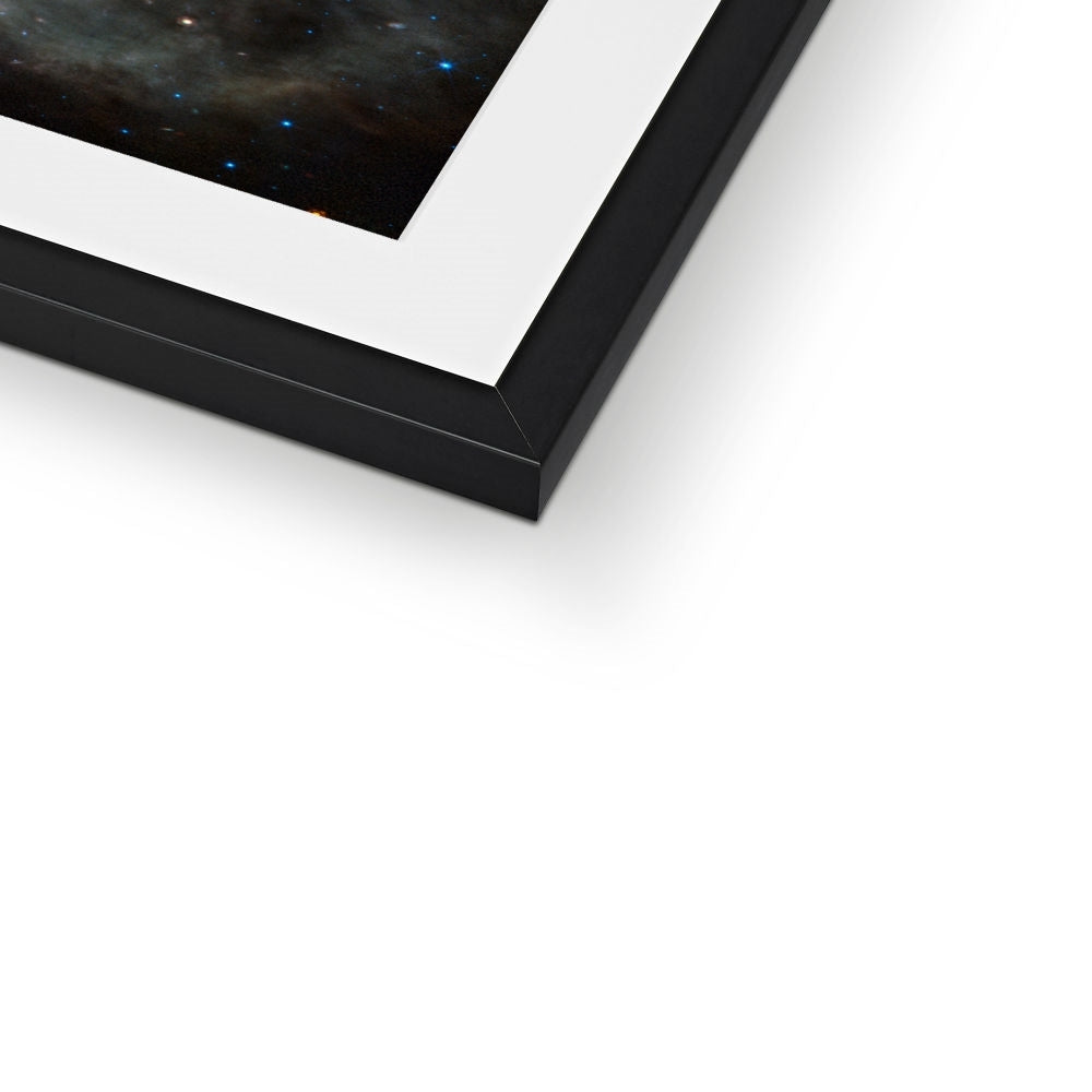 Close-up of the bottom corner of a Crab Nebula framed print showing the black frame and white mount