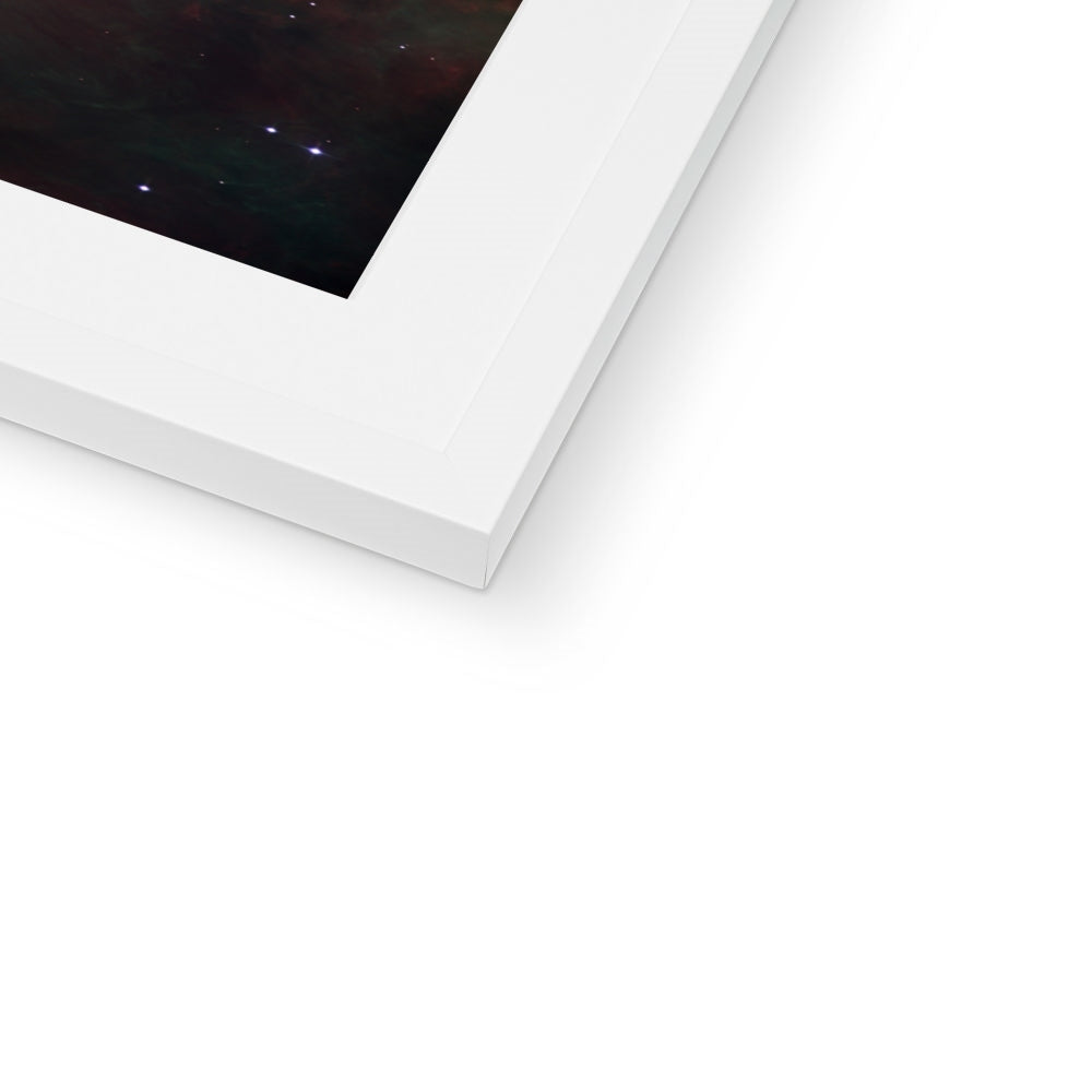 Close-up of the bottom corner of an Orion Nebula framed print showing the white frame and white mount